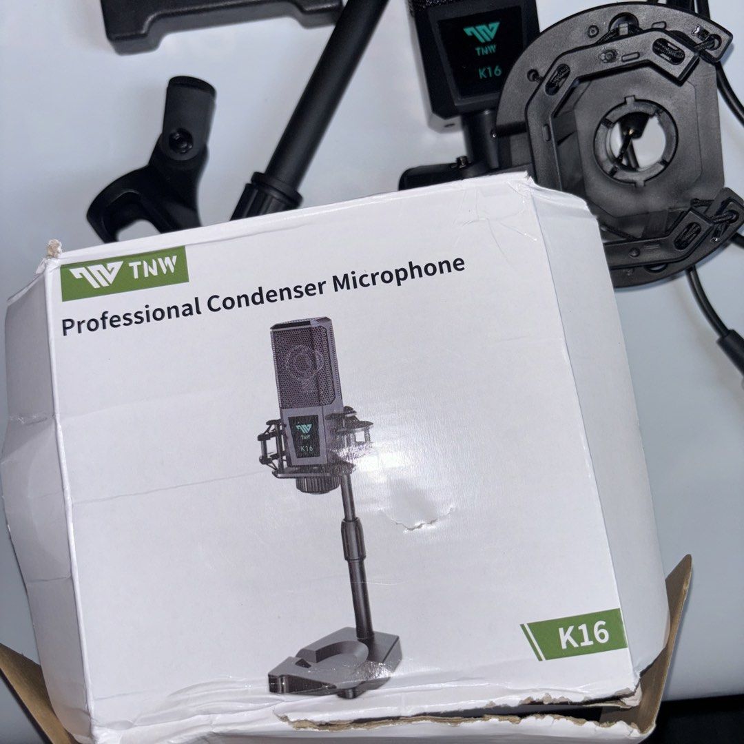 TNW K16 Professional Condenser Microphone (Category: Microphones) located in Manila. Submitted by miamoire (Listing ID 1438352357, Image 3). Description: - TNW K16 Condenser Microphone - Professional-grade - Includes: Stand, Shock Mount, Cable, and Box - Sleek Black Finish - Complete set.