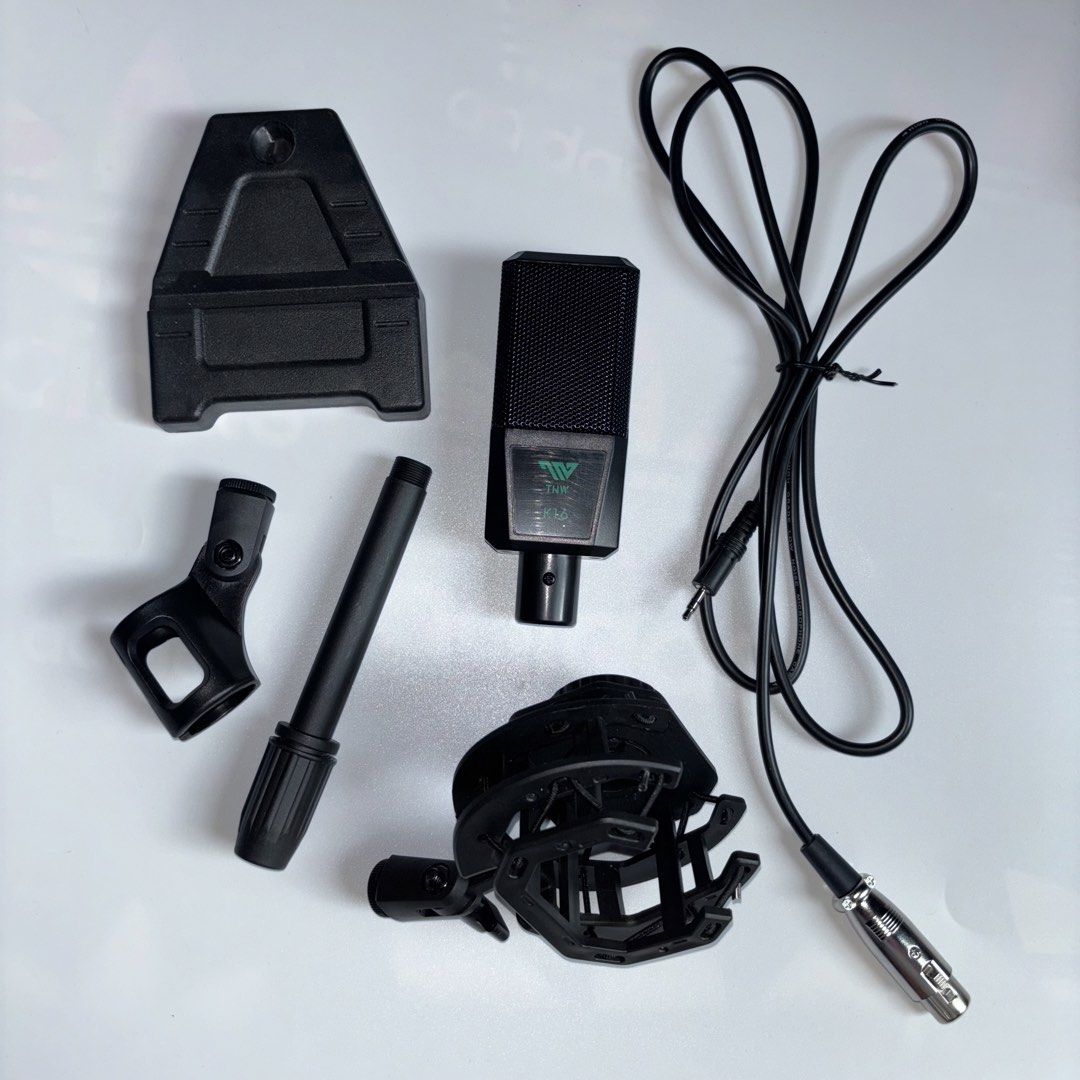 TNW K16 Professional Condenser Microphone (Category: Microphones) located in Manila. Submitted by miamoire (Listing ID 1438352357, Image 2). Description: - TNW K16 Condenser Microphone - Professional-grade - Includes: Stand, Shock Mount, Cable, and Box - Sleek Black Finish - Complete set.