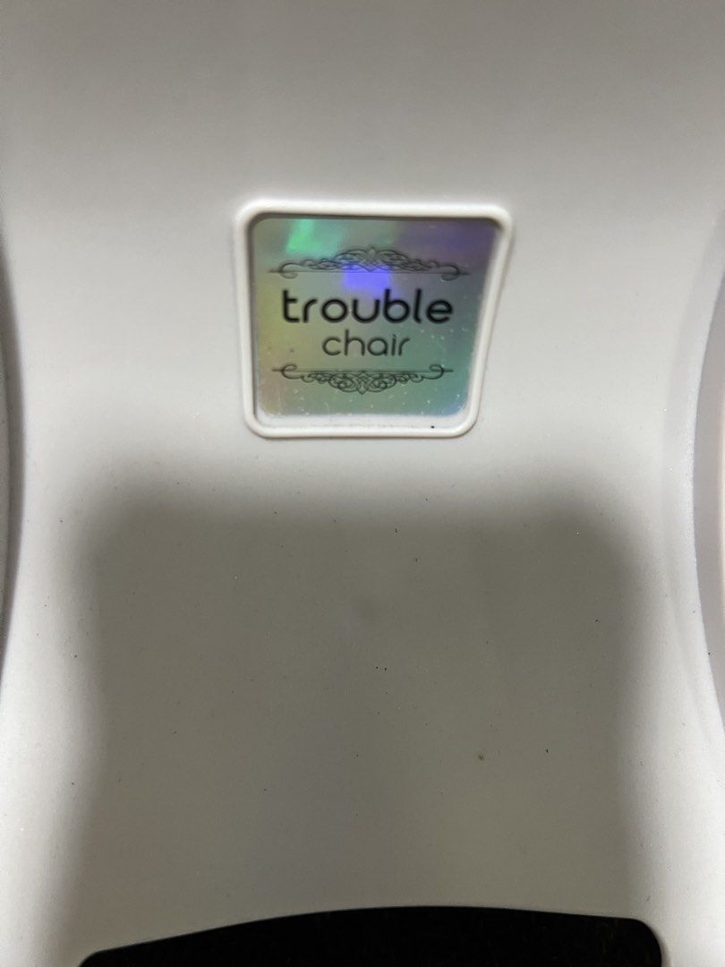 Trouble chair Posture Correction (Category: Chairs) located in Quezon City. Submitted by daday39 (Listing ID 1438457240, Image 3). Description: - Trouble Brand Ergonomic Trouble Chair - White frame - Gray padded cushions - Unique design for ergonomic support - Features the Trouble Chair logo - Clean and well-maintained Made in Korea.