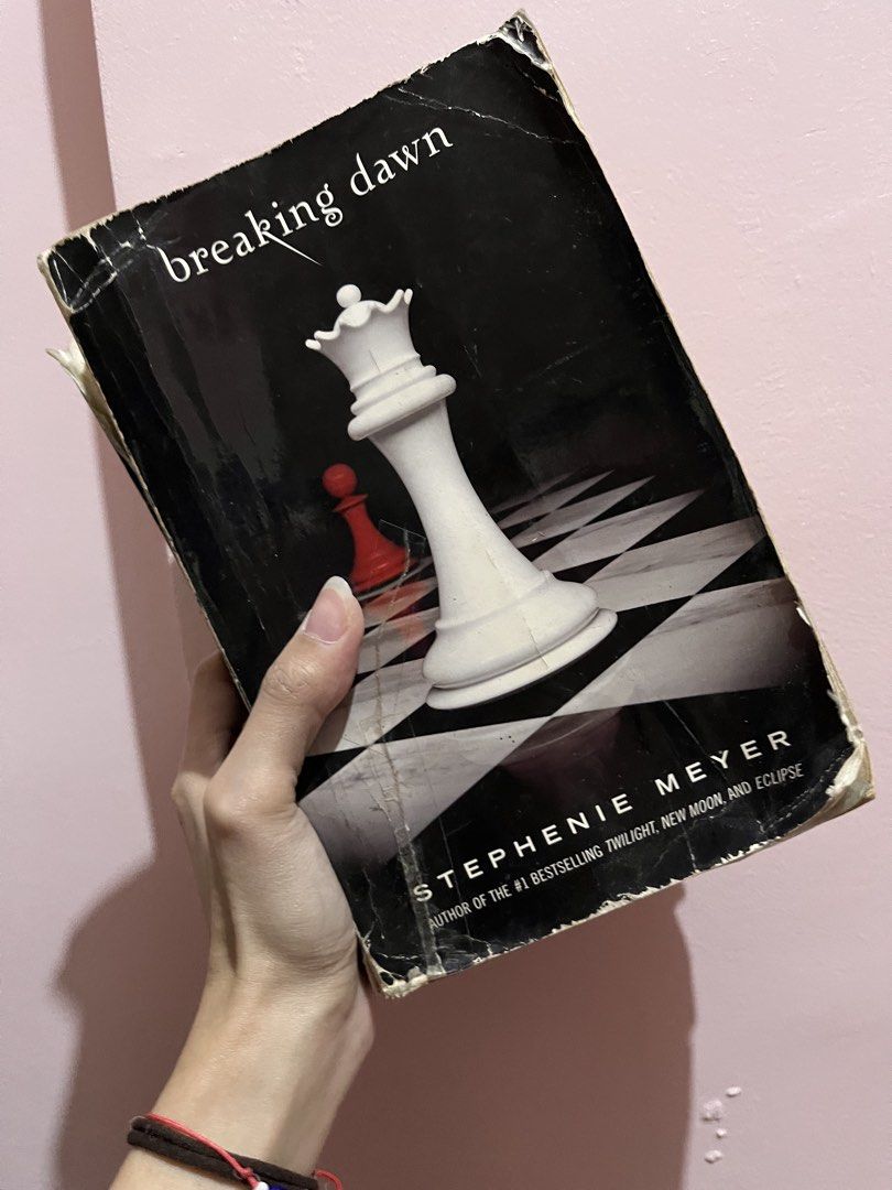 Twilight Saga Books by Stephenie Meyer (Category: Storybooks) located in Quezon City. Submitted by declutter_xo (Listing ID 1438381305, Image 2). Description: - Set of three Twilight Saga books: New Moon, Breaking Dawn, and Eclipse. - International editions. - Some cover damage present..