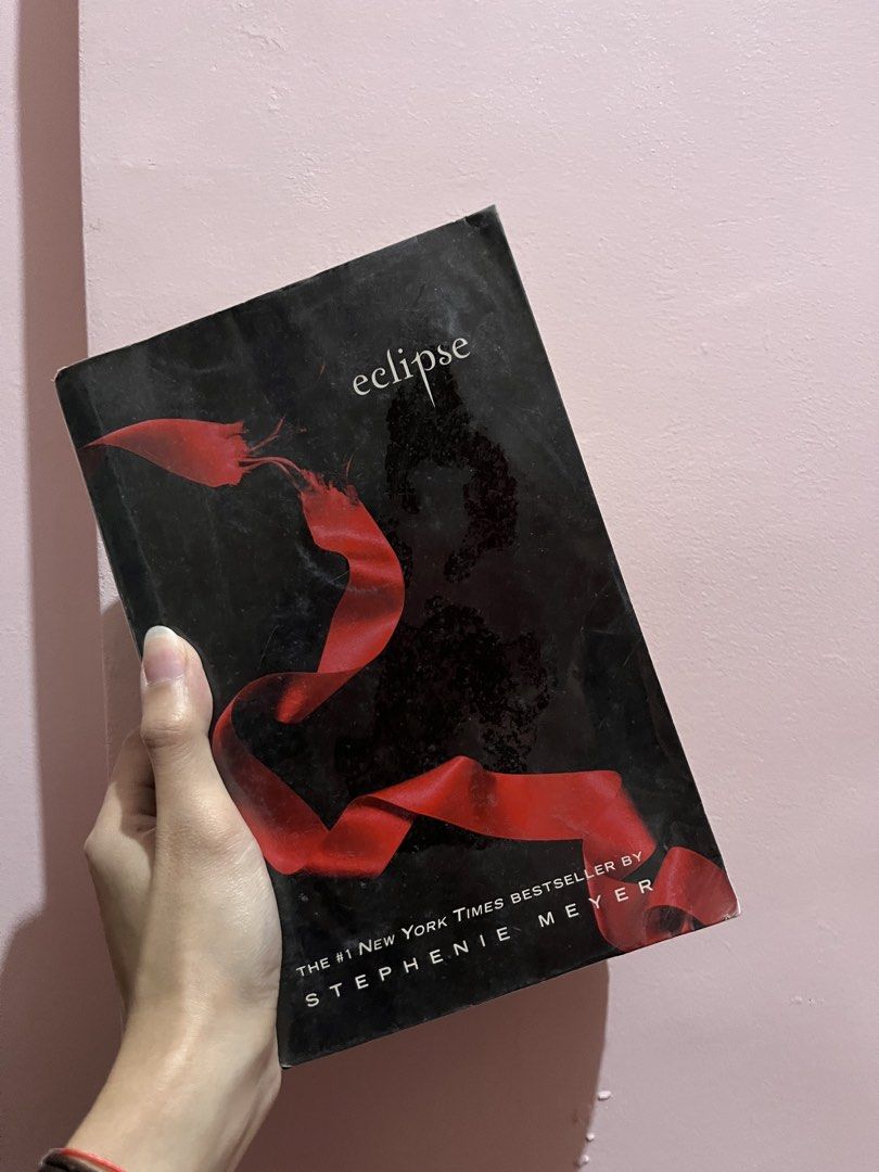 Twilight Saga Books by Stephenie Meyer (Category: Storybooks) located in Quezon City. Submitted by declutter_xo (Listing ID 1438381305, Image 3). Description: - Set of three Twilight Saga books: New Moon, Breaking Dawn, and Eclipse. - International editions. - Some cover damage present..