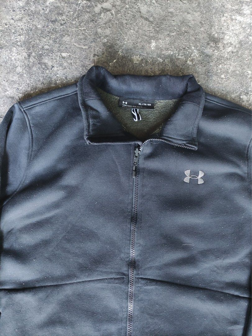 Under Armour full-zip fleece track jacket (Category: Activewear) located in Bocaue. Submitted by mosthighcollective (Listing ID 1438456694, Image 2). Description: Under Armour full-zip fleece track jacket Size: XL on tag Dimes: 23.5 width 27 length Excellent condition No issue 900 only Dm me to purchase 📥.