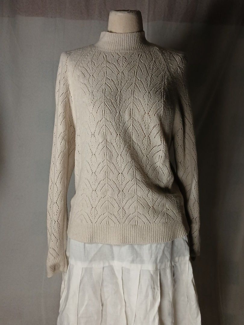 Uniqlo Knitted semi turtleneck (Category: Coats, Jackets and Outerwear) located in Calamba. Submitted by louisa_pons (Listing ID 1438408118, Image 2). Description: Stretchable and soft. Fits Small up to Medium best. No damages, great condition, and has a warm cream color. Open for negotiations!!🤗❤️.