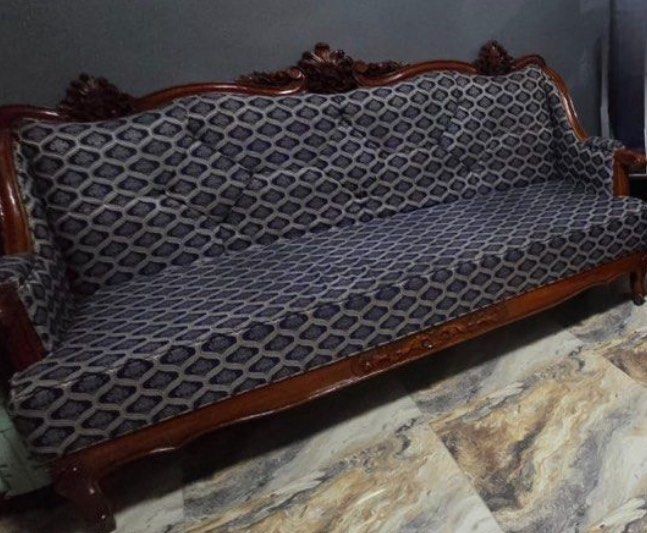 Vintage Wooden Sofa with Patterned Upholstery (Category: Sofas) located in Manila. Submitted by letsirkrom34542 (Listing ID 1438387568, Image 1). Description: - Vintage sofa - Intricate wooden detailing - Patterned upholstery - Classic design - Comfortable seating - Adds vintage charm Selling one set of wooden with foam sofa color blue, design as per picture. Wet and dry cleaning at foam and re-varnish of wooden part done last month. Sophisticate
