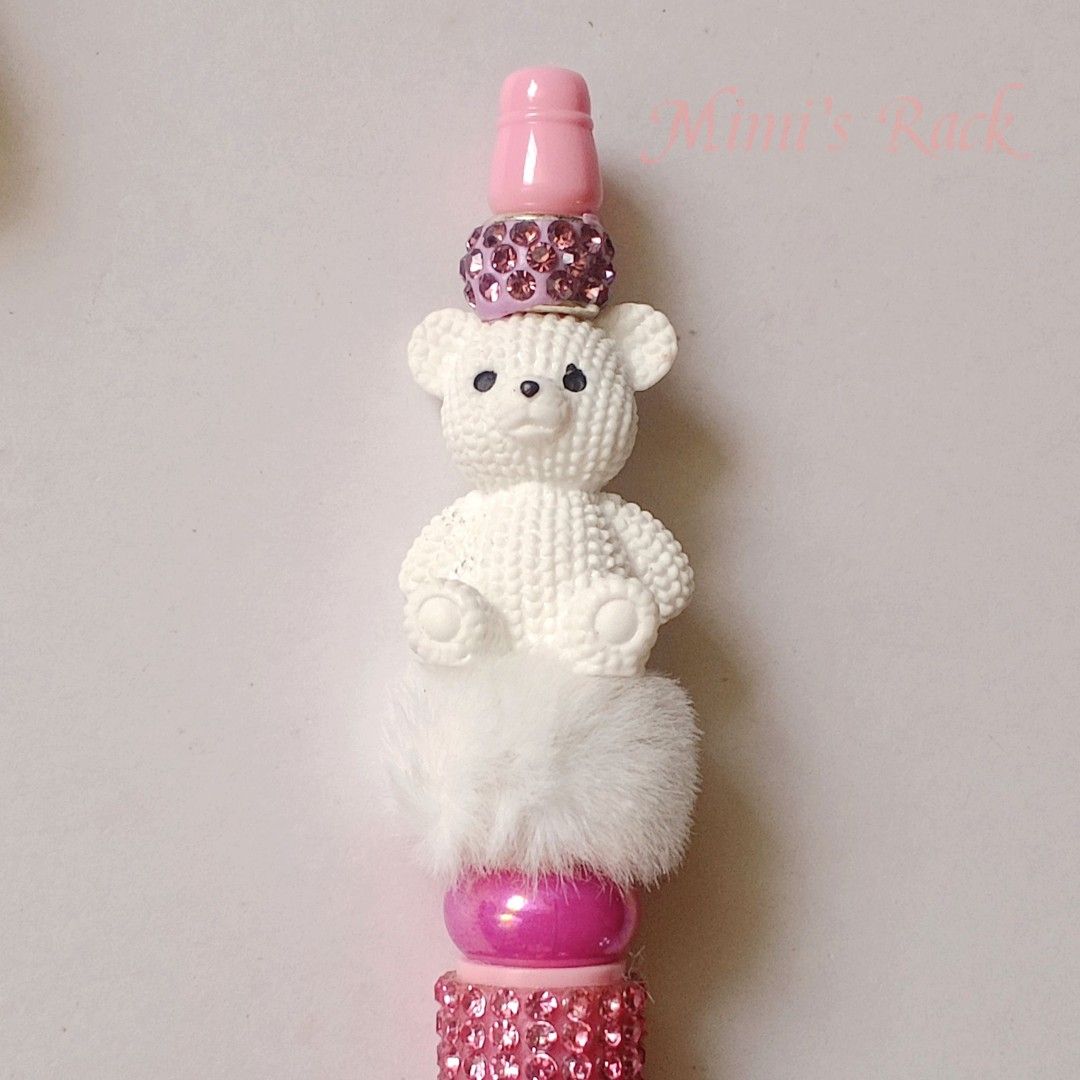 White Teddy Bear Rhinestone Pen Beadable Pen Beaded Pen (Category: Stationery & School Supplies) located in Taguig. Submitted by mimisrack (Listing ID 1438328935, Image 1). Description: 🤍An adorable pink pen featuring a cute white teddy bear topper, fluffy pompom detail, and sparkling rhinestone accents 💖✨ Perfect for girls who love cute and stylish stationery. • Features an adorable white teddy bear topper with fluffy pompom detail • Decorated