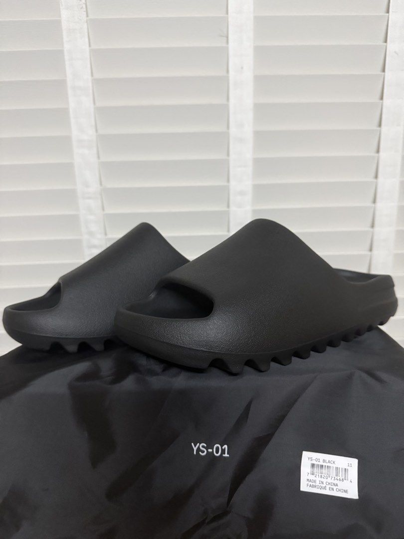 YEEZY Slide YS-01 Black 10/11 US (Category: Slippers & Slides) located in Quezon City. Submitted by justthinkingg (Listing ID 1438398803, Image 1). Description: For sale - YEEZY Slide YS-01 Black BRAND NEW❗️ On hand - 5.5k each Size 10US Size 11US Buyer shoulders delivery fee Location: Sta Mesa, QC Complete with dust bag Follow us at IG: apex.hype.