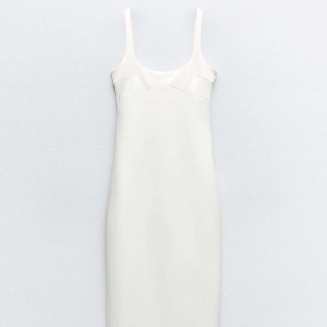 Zara White Maxi Dress (Category: Dresses) located in Mandaluyong City. Submitted by meridaaa (Listing ID 1438482215, Image 2). Description: - White maxi dress - Square neckline - Bodycon fit - Perfect for a night out or special occasion - Versatile: dress it up or down - Worn once.