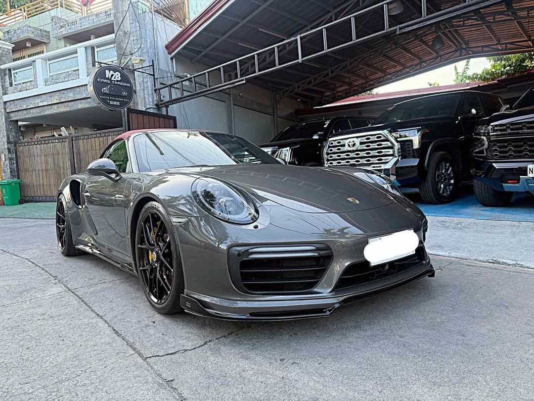 2018 Turbo s 991.2 Cabriolet Auto (Category: Used Cars) located in Bacoor. Submitted by myronemz8 (Listing ID 1438556998, Image 2). Description: For Sale/Swap 2018 Turbo s 991.2 Cabriolet 1 of 2 in ph cab Full specs Red top Grey on mocha interior Carbon ceramic brakes W/ Front lift Sports chrono package Bucket seats Burmester sounds upgrades: Moshammer chin Moshammer sideskirts Moshammer diffuser Moshammer intake duct Moshammer wing BBS Duralum M