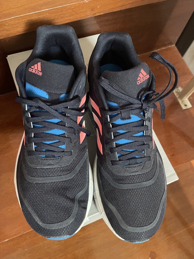Adidas Duramo 10 Running Shoes (Category: Sneakers) located in Manila. Submitted by rizver2026 (Listing ID 1438606312, Image 1). Description: - Adidas Duramo 10 running shoes - Color: Navy blue with pink accents - Blue sole, white midsole - Size: US 8 / UK 7.5 - Includes original box - Model number: GW8347 - Original price: PHP 3,000.
