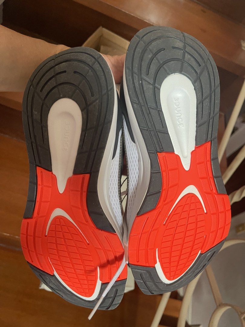 Adidas EQ21 Run White Running Shoes (Category: Sneakers) located in Manila. Submitted by rizver2026 (Listing ID 1438606419, Image 3). Description: - Adidas EQ21 Run running shoes - Color: White with orange Adidas logo - Size: 7.5 US - Original Price: PHP 4,500 (as seen on box) - Sole: Black and red - Upper: White mesh with black stripes.
