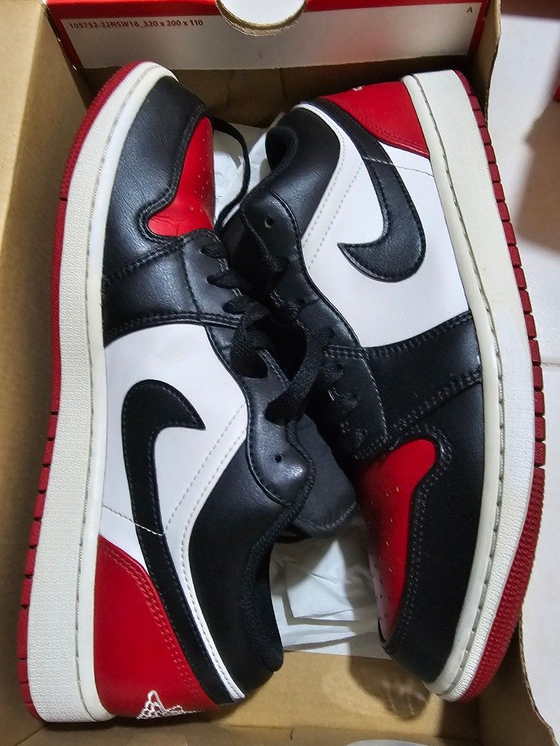 Air Jordan 1 Low - Black/White/Red (Category: Sneakers) located in Pasig City. Submitted by mon_08 (Listing ID 1438562815, Image 1). Description: - Air Jordan 1 Low sneakers - Classic black, white, and red colorway - Size: US 9.5 - Comes with original box - Black laces - NEGOTIABLE .