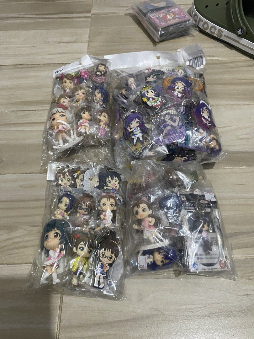 Anime Figures and Keychains (Category: Toys & Games) located in Manila. Submitted by jusstoys.phil (Listing ID 1438535621, Image 1). Description: - Anime figure and keychain collection - Features various characters - Includes keychains with clear acrylic design - All items are in sealed packaging.
