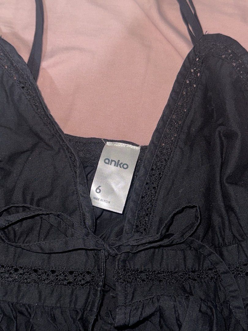 Anko Black Cami Top (Category: Sleeveless) located in Quezon City. Submitted by _jasminkae (Listing ID 1438648237, Image 2). Description: • Bought from Anko in Melbourne • Used once with inner wear (doesn’t completely cover my whole body because the size is too small).