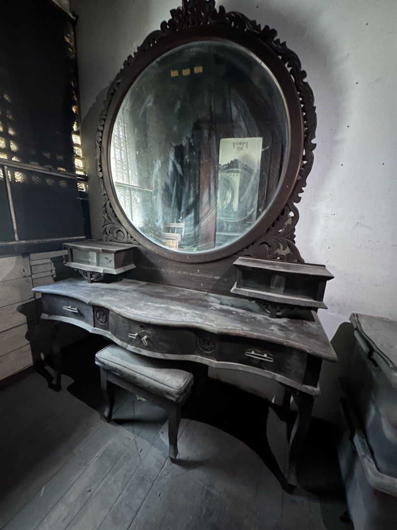 Antique Wooden Vanity Set Table with Mirror (Category: Tables & Sets) located in Manila. Submitted by clamchowder19 (Listing ID 1438530308, Image 1). Description: - Antique vanity table - Large round mirror - Multiple drawers and side compartments - Includes stool - Intricate carvings and classic design - Perfect for vintage charm.