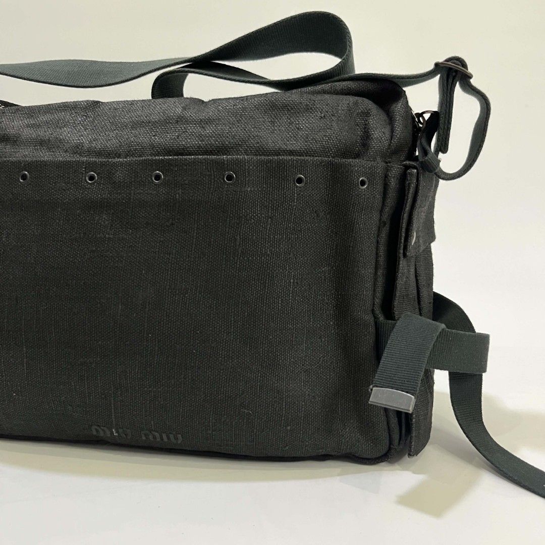 MIU MIU TECHNICAL CANVAS MESSENGER BAG (Category: Luxury Bags & Wallets) located in Bacolod City. Submitted by the.finest (Listing ID 1438682778, Image 3). Description: Miu Miu Archive - Technical Messenger Bag Condition: 9/10 Normal signs of wear and missing Letter I on the embossed logo Material: Heavy-duty Technical Canvas Zip: Lampo 18,000+shipping fee.
