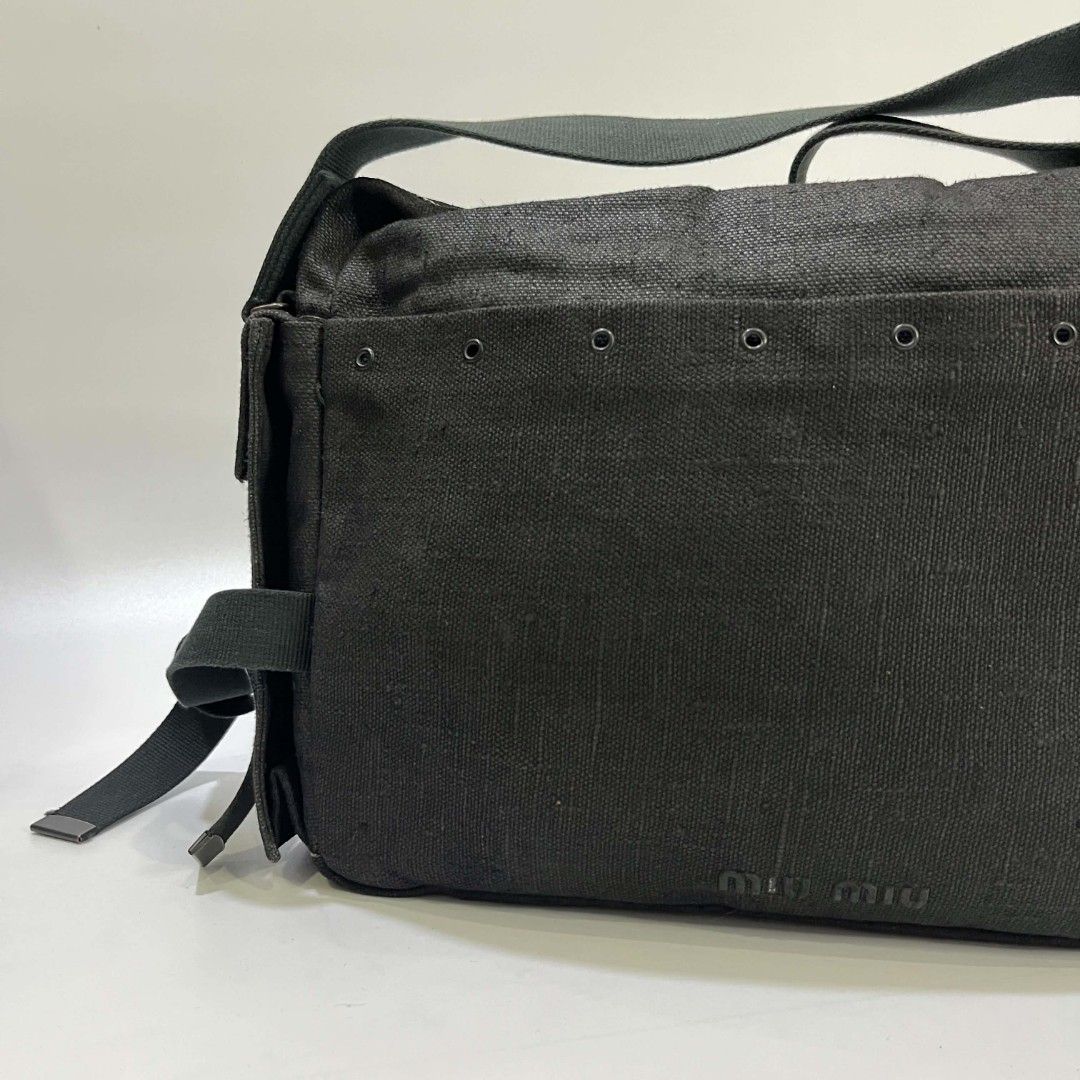 MIU MIU TECHNICAL CANVAS MESSENGER BAG (Category: Luxury Bags & Wallets) located in Bacolod City. Submitted by the.finest (Listing ID 1438682778, Image 2). Description: Miu Miu Archive - Technical Messenger Bag Condition: 9/10 Normal signs of wear and missing Letter I on the embossed logo Material: Heavy-duty Technical Canvas Zip: Lampo 18,000+shipping fee.