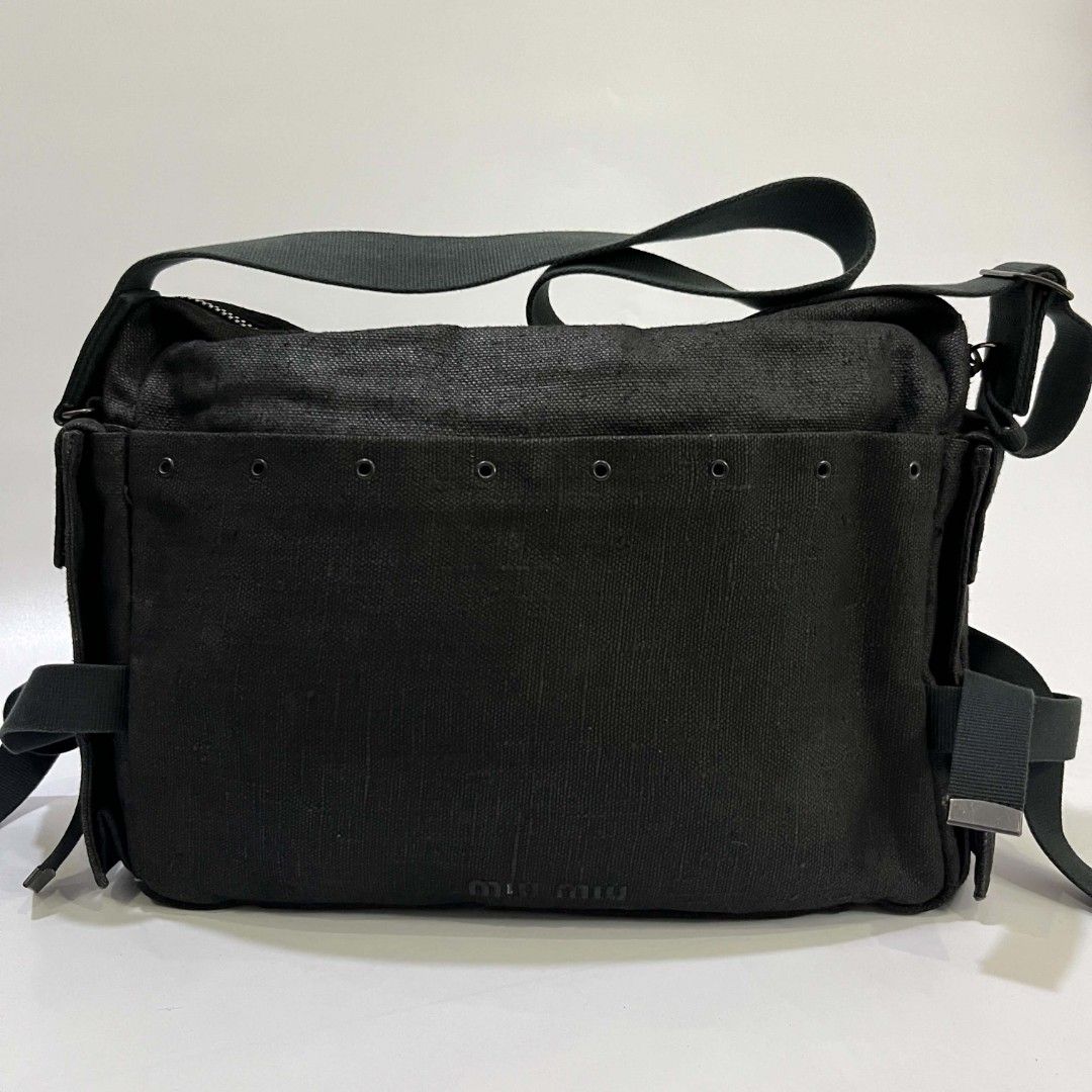 MIU MIU TECHNICAL CANVAS MESSENGER BAG (Category: Luxury Bags & Wallets) located in Bacolod City. Submitted by the.finest (Listing ID 1438682778, Image 1). Description: Miu Miu Archive - Technical Messenger Bag Condition: 9/10 Normal signs of wear and missing Letter I on the embossed logo Material: Heavy-duty Technical Canvas Zip: Lampo 18,000+shipping fee.