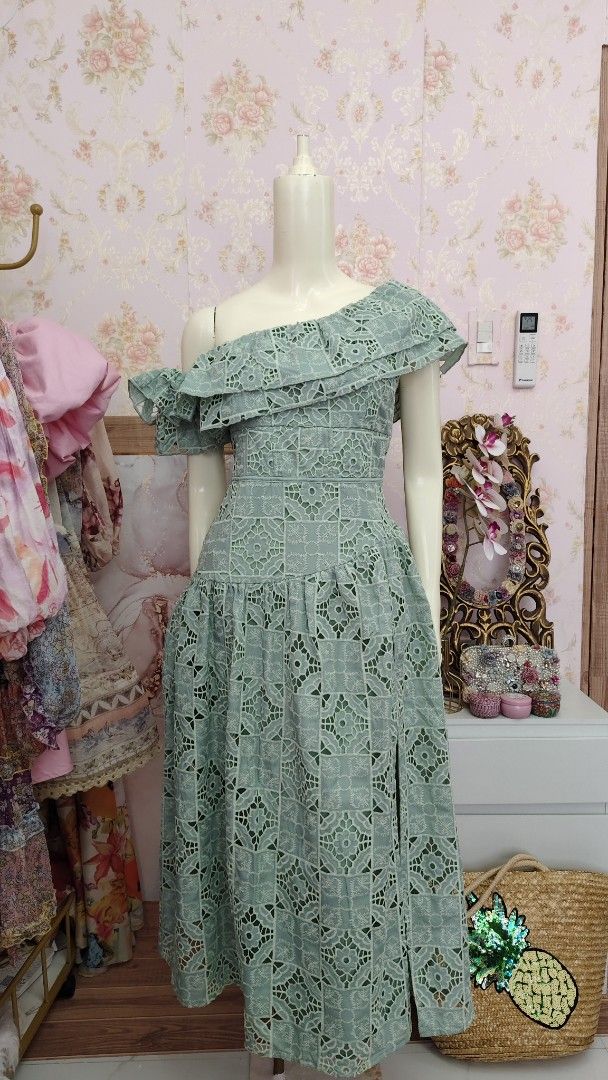 ASOS Sage Drop Waist One Shoulder Lace Dress (Category: Dresses) located in Pagudpud. Submitted by altheacee063978 (Listing ID 1438646226, Image 3). Description: - Mint green midi dress - Off-shoulder design - Ruffled neckline - Unique lace-like pattern - High slit on one side - Suitable for special occasions.
