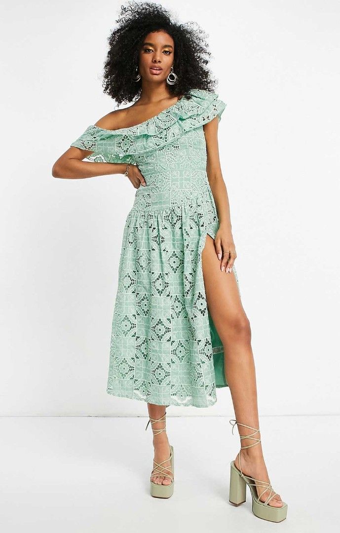 ASOS Sage Drop Waist One Shoulder Lace Dress (Category: Dresses) located in Pagudpud. Submitted by altheacee063978 (Listing ID 1438646226, Image 1). Description: - Mint green midi dress - Off-shoulder design - Ruffled neckline - Unique lace-like pattern - High slit on one side - Suitable for special occasions.