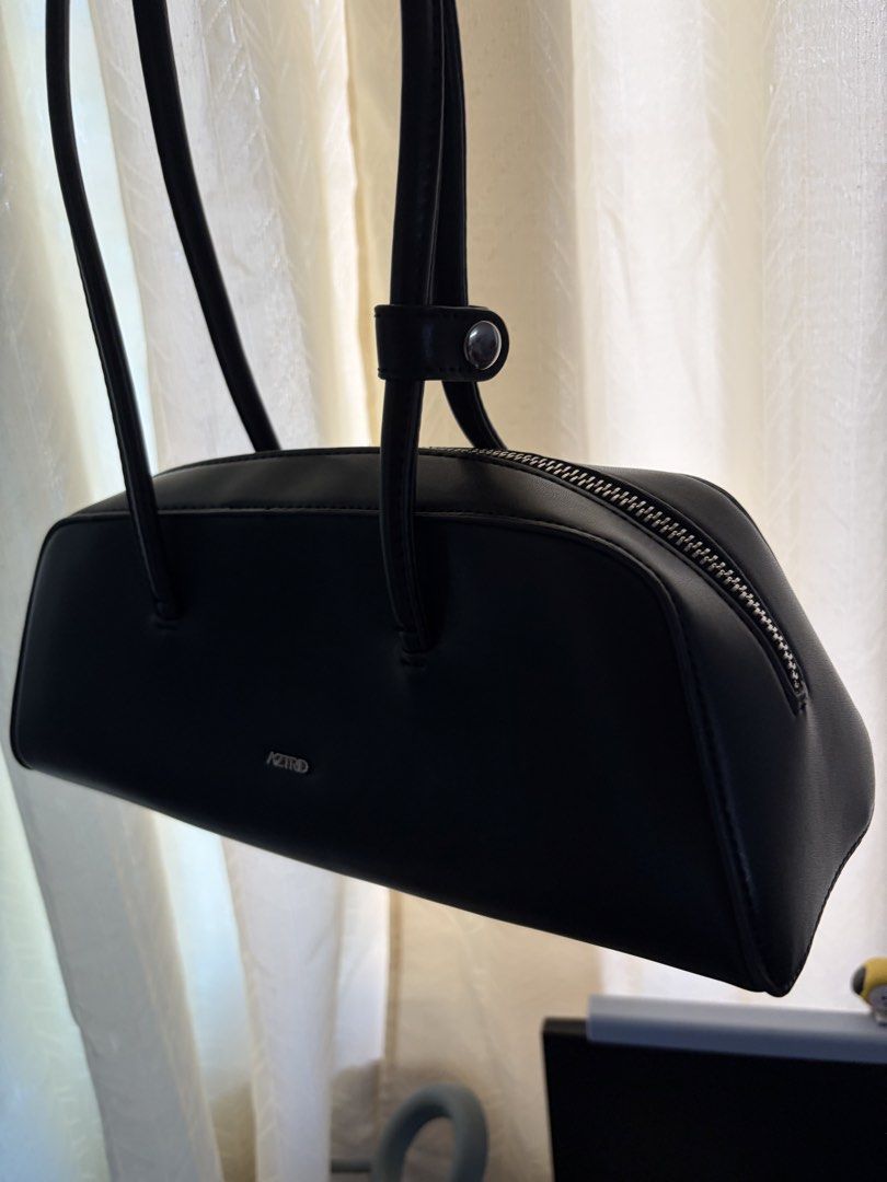 Astrid bowling bag (Category: Shoulder Bags) located in Rizal. Submitted by katmandulovesmakeup (Listing ID 1438507788, Image 2). Description: Black Astrid Bowling bag With box Once used Excellent condition.