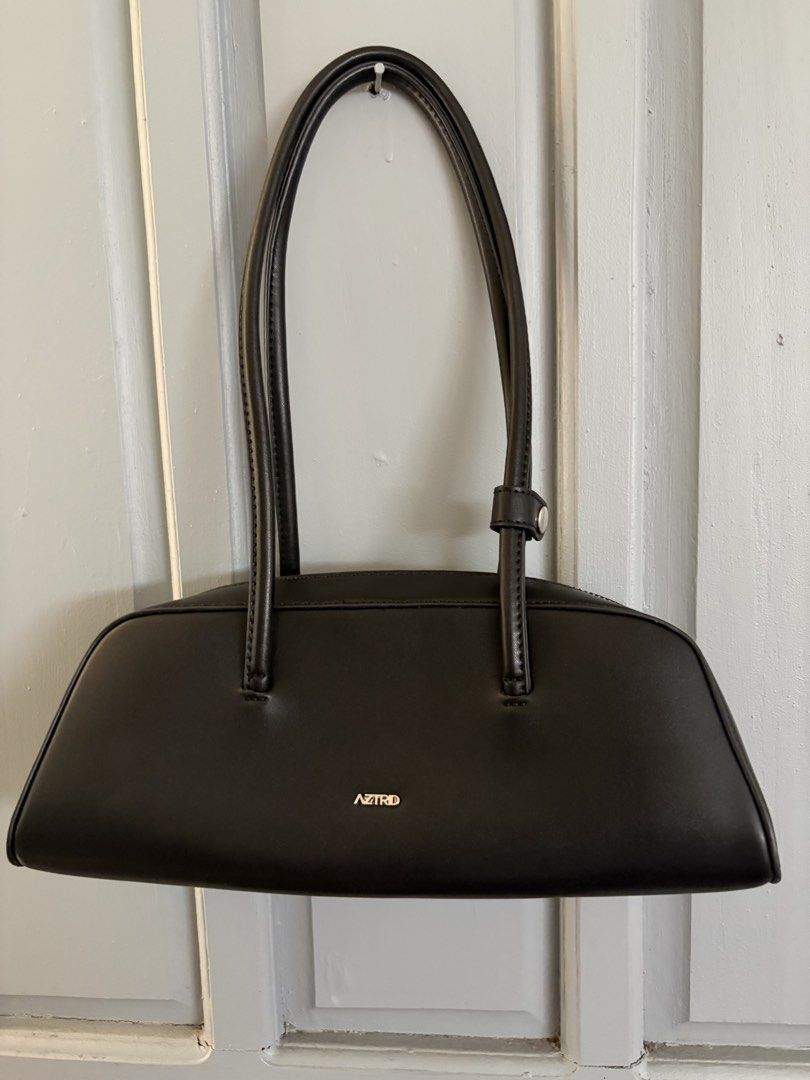Astrid bowling bag (Category: Shoulder Bags) located in Rizal. Submitted by katmandulovesmakeup (Listing ID 1438507788, Image 1). Description: Black Astrid Bowling bag With box Once used Excellent condition.