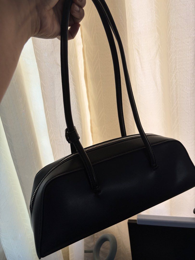 Astrid bowling bag (Category: Shoulder Bags) located in Rizal. Submitted by katmandulovesmakeup (Listing ID 1438507788, Image 3). Description: Black Astrid Bowling bag With box Once used Excellent condition.