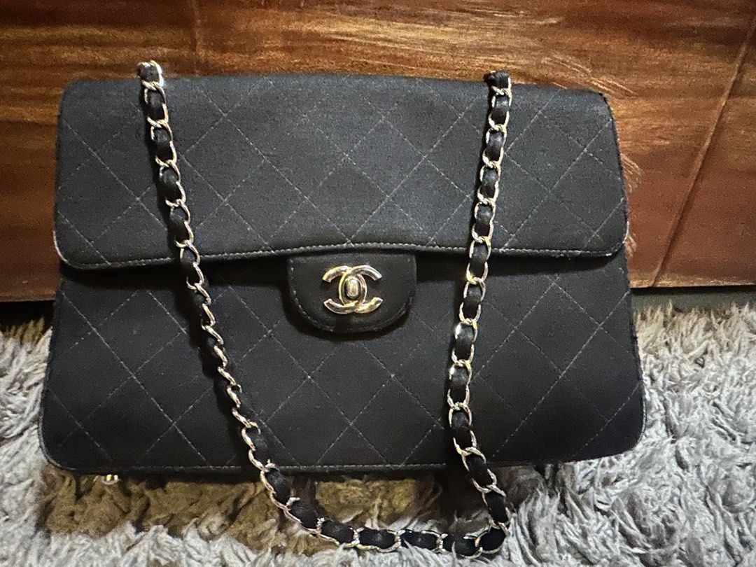 Authentic Chanel Vintage Jersey Flap Bag (Category: Luxury Bags & Wallets) located in San Pablo. Submitted by donaya_luxe (Listing ID 1438509202, Image 1). Description: Authentic Chanel Flap Medium Size Holo intact but faded logo since its vintage already No inclusions. This is from my legitimate supplier from Japan who does auctions. .