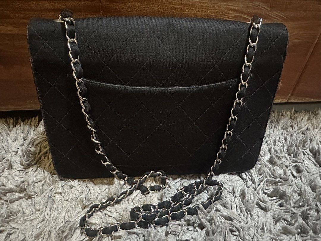 Authentic Chanel Vintage Jersey Flap Bag (Category: Luxury Bags & Wallets) located in San Pablo. Submitted by donaya_luxe (Listing ID 1438509202, Image 2). Description: Authentic Chanel Flap Medium Size Holo intact but faded logo since its vintage already No inclusions. This is from my legitimate supplier from Japan who does auctions. .