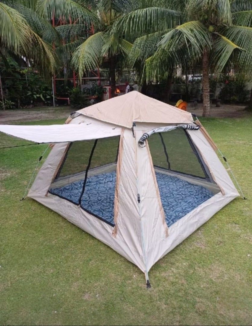 Automatic Camping Tent (Big) Water Proof Brandnew (Category: Hiking & Camping) located in Santa Rosa. Submitted by love.princess (Listing ID 1438560629, Image 1). Description: Automatic Camping Tent Very easy to open and turn down. This is huge (as you can see in the photos). Can fit up to 4-5pax. Inclusions: - 1 Camping tent - 1 Storage Bag - 1 Top protective cover - 2 Gate yard poles - 4 Windproof ropes - 8 Metal tent pegs Can have it delivered