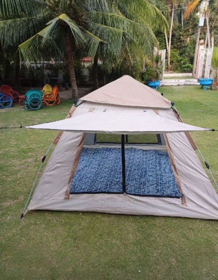 Automatic Camping Tent (Big) Water Proof Brandnew (Category: Hiking & Camping) located in Santa Rosa. Submitted by love.princess (Listing ID 1438560629, Image 2). Description: Automatic Camping Tent Very easy to open and turn down. This is huge (as you can see in the photos). Can fit up to 4-5pax. Inclusions: - 1 Camping tent - 1 Storage Bag - 1 Top protective cover - 2 Gate yard poles - 4 Windproof ropes - 8 Metal tent pegs Can have it delivered