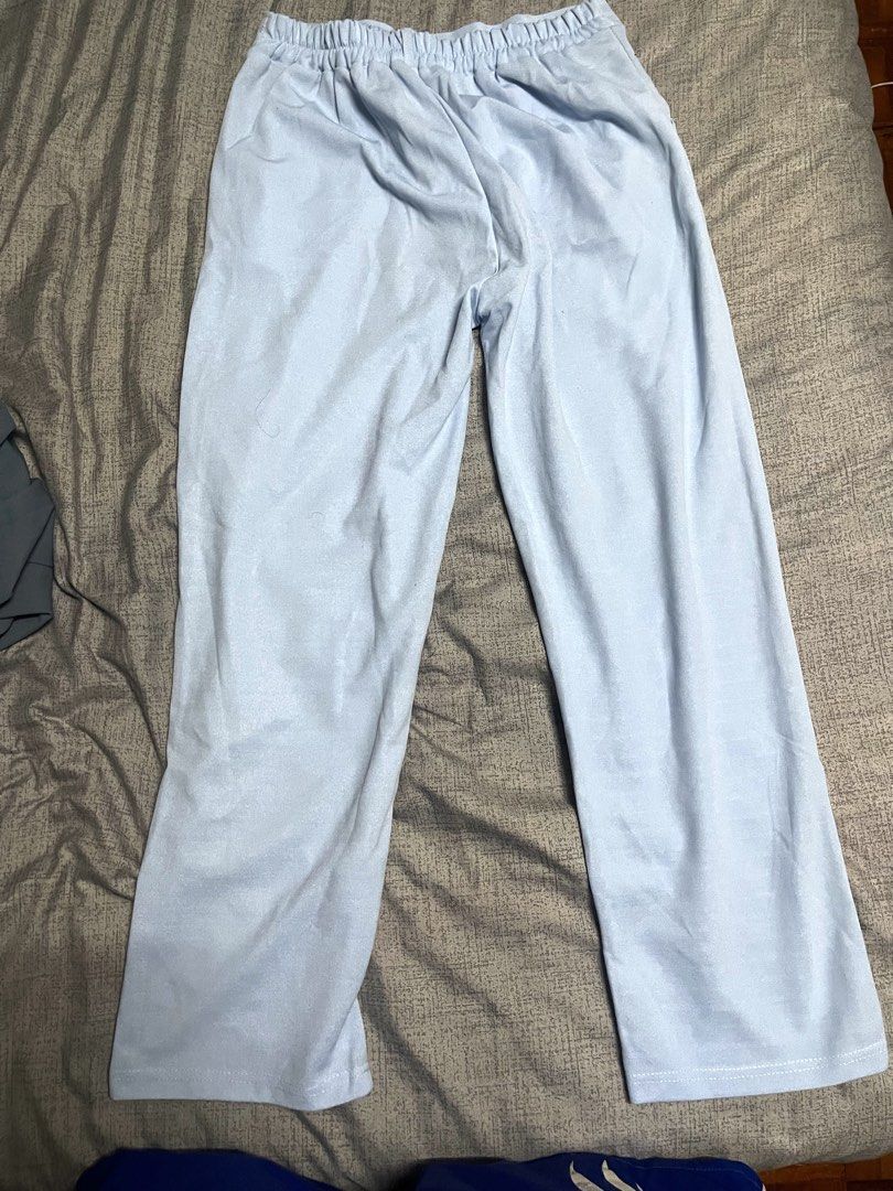 Baby Blue Wide Leg Pants (Category: Other Bottoms) located in Quezon City. Submitted by listless32 (Listing ID 1438691405, Image 3). Description: Waist 29-36 L 38 nay dumi you can check sa pic nalng , Light blue wide-leg pants with button and zipper closure. Soft fabric, relaxed fit, perfect for casual wear. Note: has two small spots..