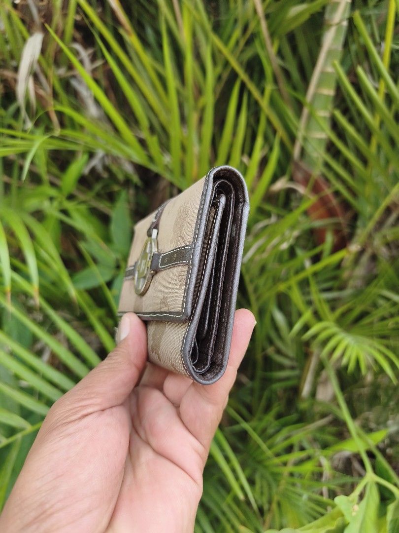 Balmain PARIS B Logo Wallet (Category: Luxury Bags & Wallets) located in Bulacan. Submitted by THA_D_THRIFT (Listing ID 1438646179, Image 3). Description: - Balmain bi-fold wallet - Features repeating logo pattern - Prominent B logo clasp - Beige fabric exterior - Brown leather trim FRESH FROM JAPAN SOURCE EXCELLENT CONDITION 800 + SF.