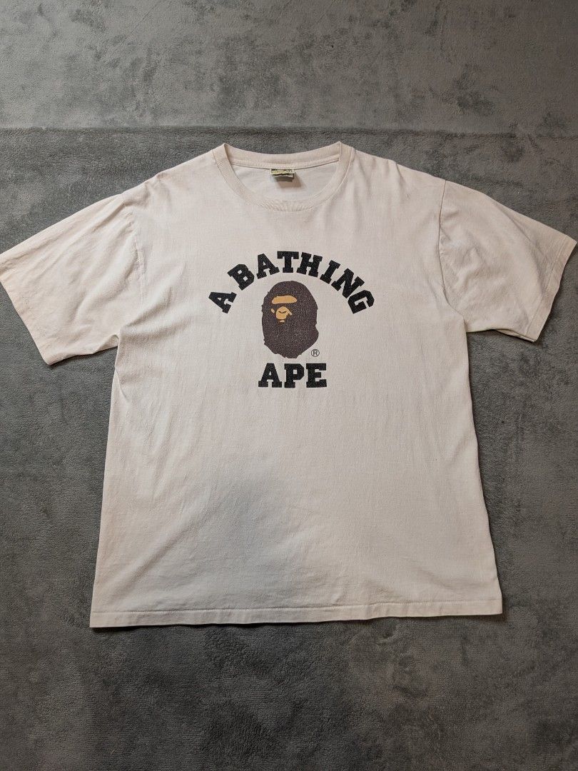 BAPE A Bathing Ape XL T-Shirt (Category: Tshirts & Polo Shirts ) located in Paniqui. Submitted by fndrs.kprs.ph (Listing ID 1438581845, Image 1). Description: Bape College Tee Size on tag: XL 22x28 Color rate: 9/10 Excellent Condition No flaws.