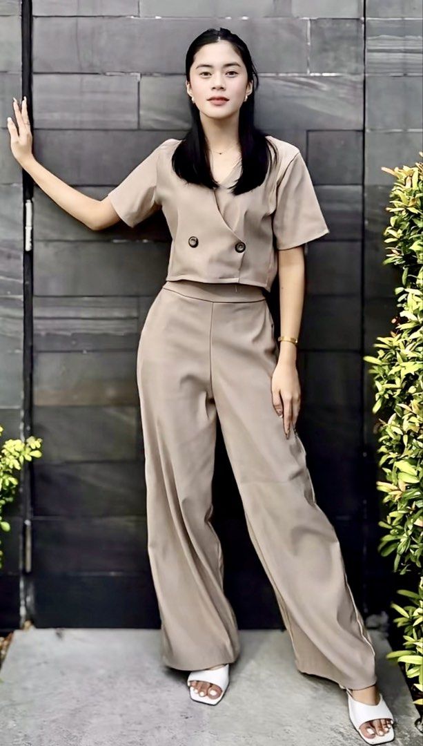 Beige Blazer and Pants Co-ord Set (Category: Sets or Coordinates) located in Manila. Submitted by prettyemz (Listing ID 1438648529, Image 2). Description: - Beige co-ord set - Short-sleeved blazer - Double-breasted buttons - V-neck design - Matching wide-leg pants - Perfect for a coordinated look - Suitable for casual and semi-formal occasions.