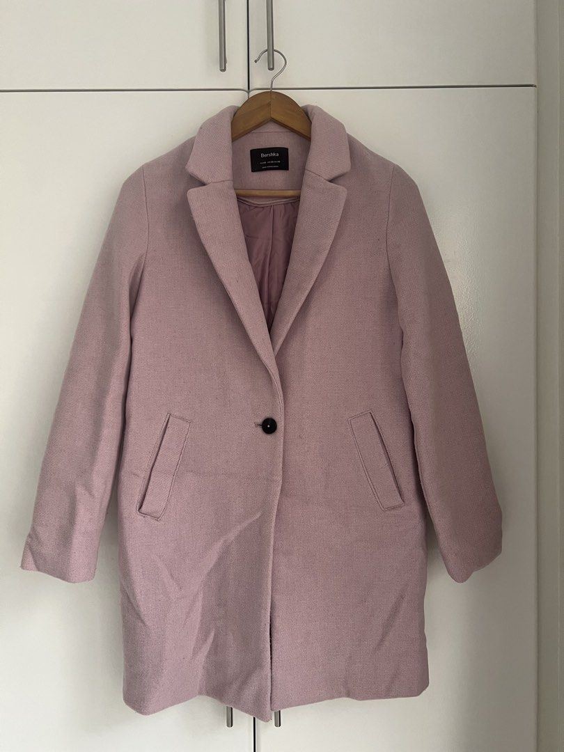 Bershka Pink Coat XS (Category: Coats, Jackets and Outerwear) located in Makati City. Submitted by jcc999 (Listing ID 1438573270, Image 2). Description: - Bershka pink coat - Size: XS - Features: - Single-button closure - Two front pockets - Classic lapel collar - Color: Light pink - Made in Bangladesh - Material: 70% polyester, 30% lana-wool - already dry cleaned.