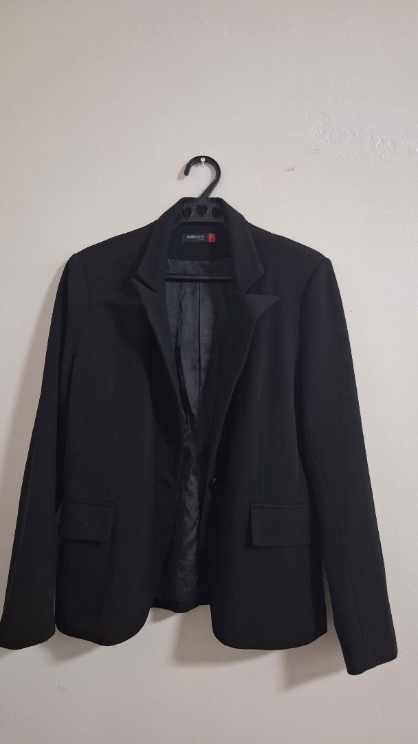 Black Blazer (Category: Coats, Jackets and Outerwear) located in Quezon City. Submitted by declutteringpurpose (Listing ID 1438567439, Image 1). Description: - Classic black blazer - Simple and elegant design - Suitable for various occasions.