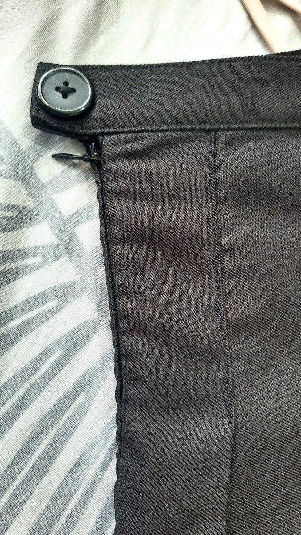 Black Pleated Skirt (Category: Skirts) located in Cainta. Submitted by tinsbottomdrawer (Listing ID 1438574837, Image 2). Description: - Black pleated skirt - Button and zipper closure - Classic design - Evenly spaced pleats - Smooth, dark fabric Measurement: Waist: 33cm Length: 36cm.