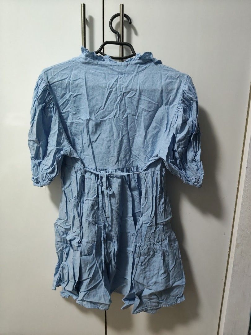 Blue Dress with Ruffle Details (Category: Dresses) located in Mandaluyong City. Submitted by derekalava (Listing ID 1438614143, Image 2). Description: - Blue V-neck dress - Ruffle collar detail - Short, puffy sleeves - Tiered skirt - Tie back waist detail - Lightweight fabric size small to medium if interested please call txt or pm me see pics for the condition thank you .