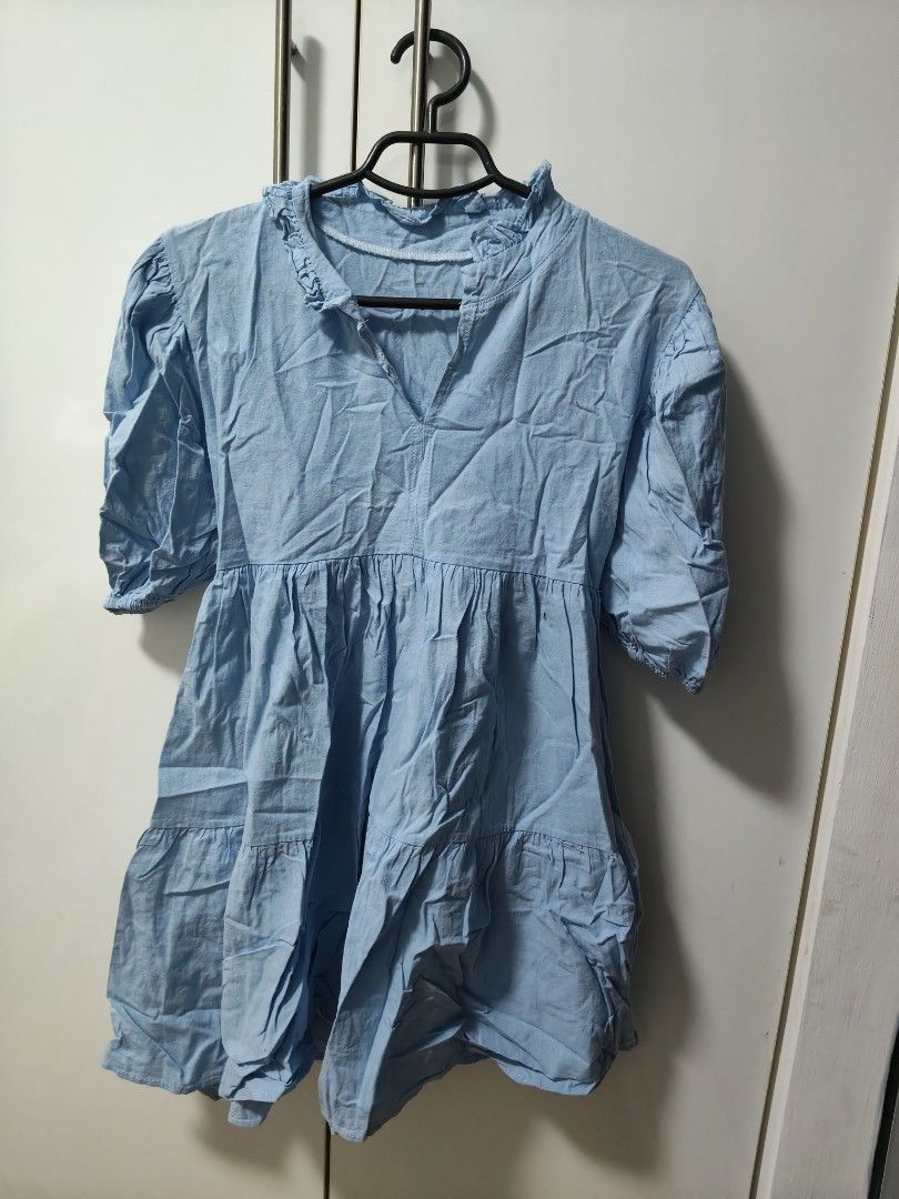 Blue Dress with Ruffle Details (Category: Dresses) located in Mandaluyong City. Submitted by derekalava (Listing ID 1438614143, Image 1). Description: - Blue V-neck dress - Ruffle collar detail - Short, puffy sleeves - Tiered skirt - Tie back waist detail - Lightweight fabric size small to medium if interested please call txt or pm me see pics for the condition thank you .