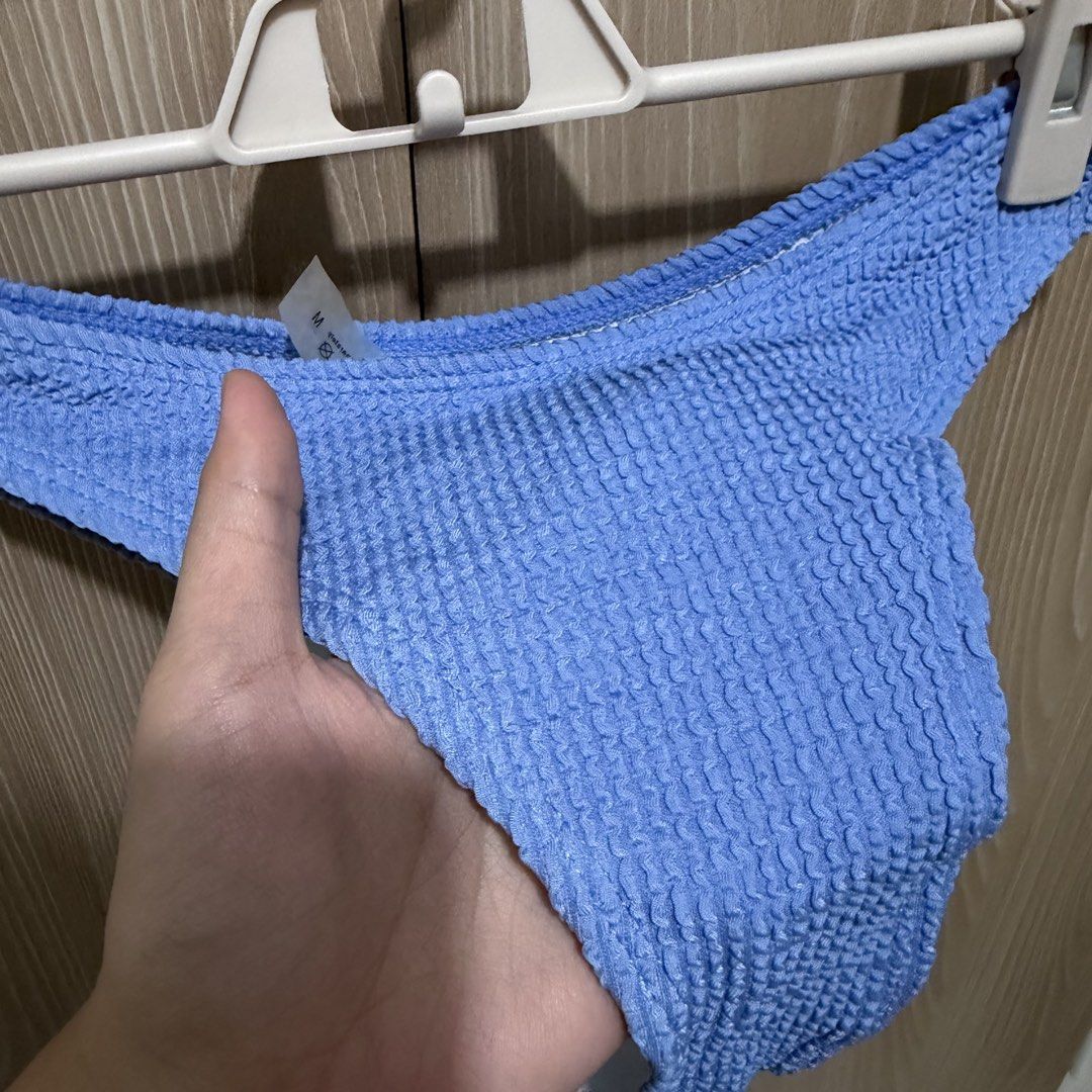 Blue Textured Bikini Set (Category: Bikinis & Swimsuits) located in Taguig. Submitted by shopsabela (Listing ID 1438628457, Image 3). Description: ❗️rfs: decluttering personal preloved clothes, no flaws ❗️mode of payment: bank transfer (BDO, unionbank, maribank) ❗️delivery: lalamove/grab/angkas (shipping fee shouldered by buyer) ❗️payment first before ship out.
