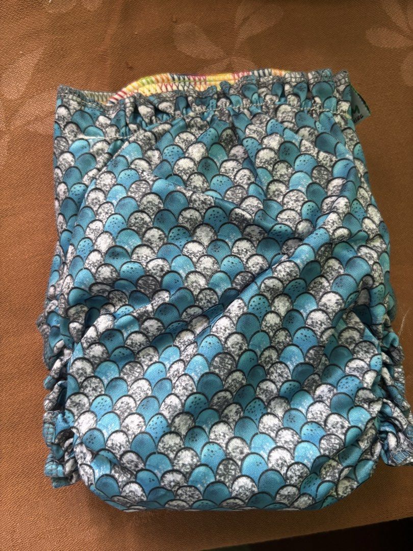 Bnew Cloth Diapers EcoBum and White Snaps (Category: Diapers & Baby Wipes) located in Antipolo. Submitted by seylecious (Listing ID 1438526884, Image 3). Description: - pack of 3 bnew cloth diaper set - Includes 2 inserts and various designs: - Blue and white scale pattern - Blue and green earth pattern - Blue stripes white pattern - Snap closures for easy adjustment - Diapers are in good, ready-to-use condition .