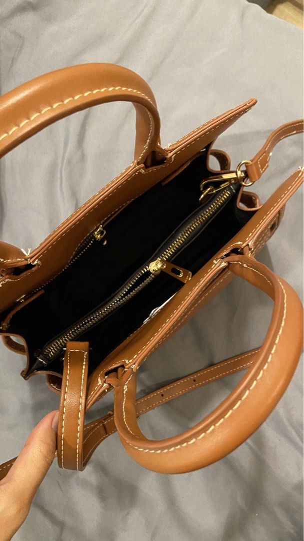 Burberry Mini Handbag with Shoulder Strap (Category: Luxury Bags & Wallets) located in Cavite. Submitted by fantastikpinay (Listing ID 1438631177, Image 2). Description: -decluttering -pre-owned -can send more pics sa dm -nego -mop gotyme/maribank/maya -mod jnt/lalamove or meetup within imus/bacoor RFS- need funds.