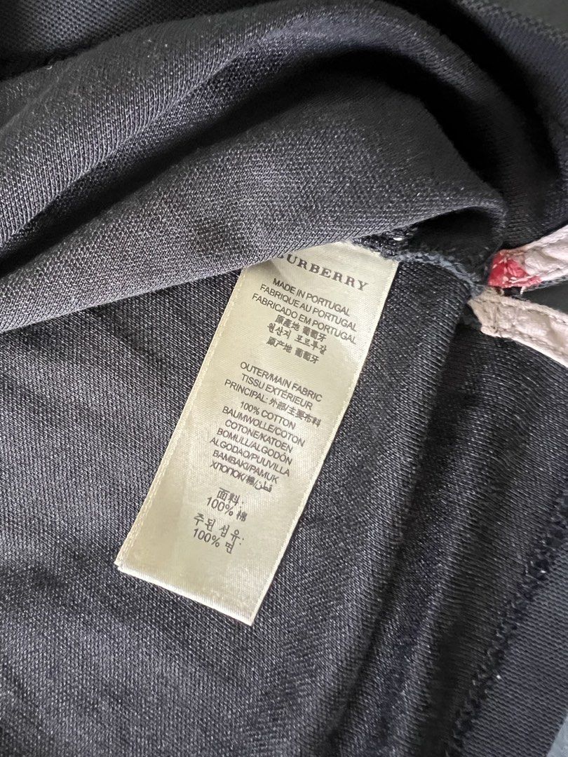 Burberry Polo Shirt - XL (Category: Tshirts & Polo Shirts ) located in Manila. Submitted by puffsxbangs (Listing ID 1438558794, Image 3). Description: - Authentic Burberry polo shirt - Color: Black - Size: XL - Classic polo collar and short sleeves - Embroidered Burberry logo Issue: seen in pics W:21 inches L: 26 inches.