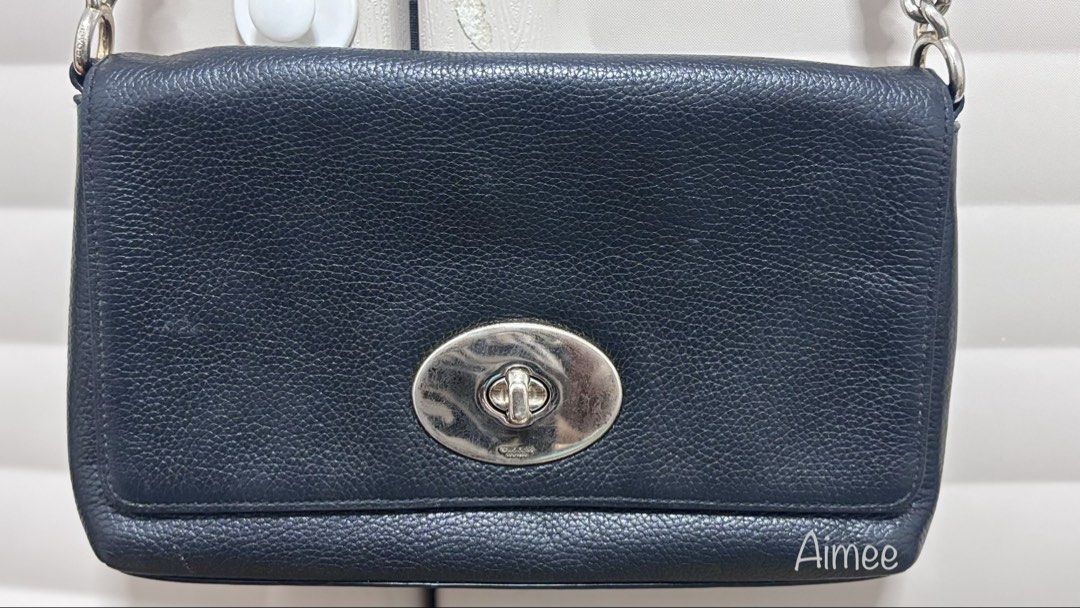 C0@ch Black Leather Crossbody Bag (Category: Luxury Bags & Wallets) located in Makati City. Submitted by _kath01 (Listing ID 1438653158, Image 2). Description: - Authentic Coach crossbody bag - Black textured leather exterior - Elegant chain strap - Secure flap closure - Features the iconic Coach label - Classic design, ideal for daily use.