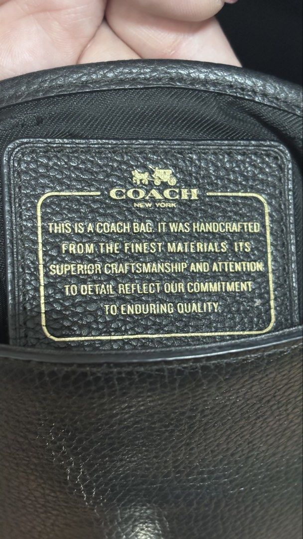 C0@ch Black Leather Crossbody Bag (Category: Luxury Bags & Wallets) located in Makati City. Submitted by _kath01 (Listing ID 1438653158, Image 3). Description: - Authentic Coach crossbody bag - Black textured leather exterior - Elegant chain strap - Secure flap closure - Features the iconic Coach label - Classic design, ideal for daily use.