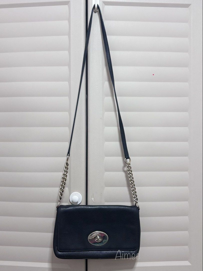 C0@ch Black Leather Crossbody Bag (Category: Luxury Bags & Wallets) located in Makati City. Submitted by _kath01 (Listing ID 1438653158, Image 1). Description: - Authentic Coach crossbody bag - Black textured leather exterior - Elegant chain strap - Secure flap closure - Features the iconic Coach label - Classic design, ideal for daily use.