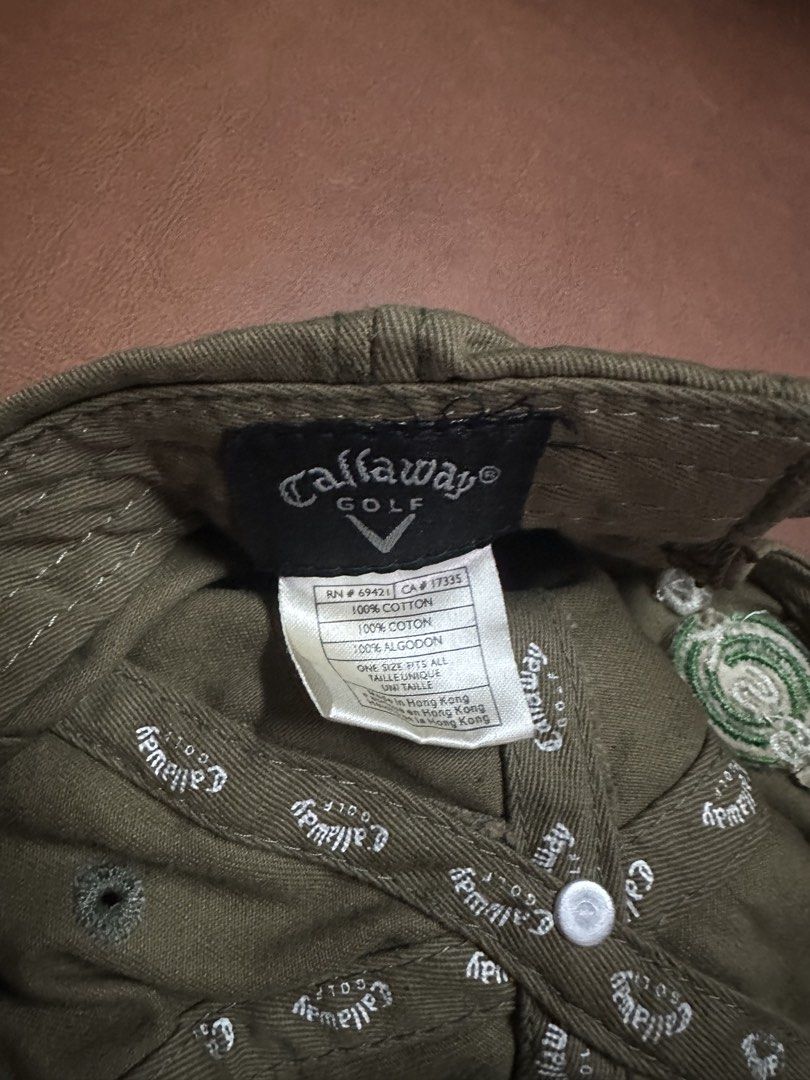 Callaway Golf Cap (Category: Caps & Hats) located in Manila. Submitted by clamchowder19 (Listing ID 1438556784, Image 3). Description: - Callaway Golf cap - Olive green color - White embroidery - Features Callaway logo on front - "HX TOUR" and "FT-3" embroidered details - Made of 100% cotton - Curved brim - Adjustable strap at the back.