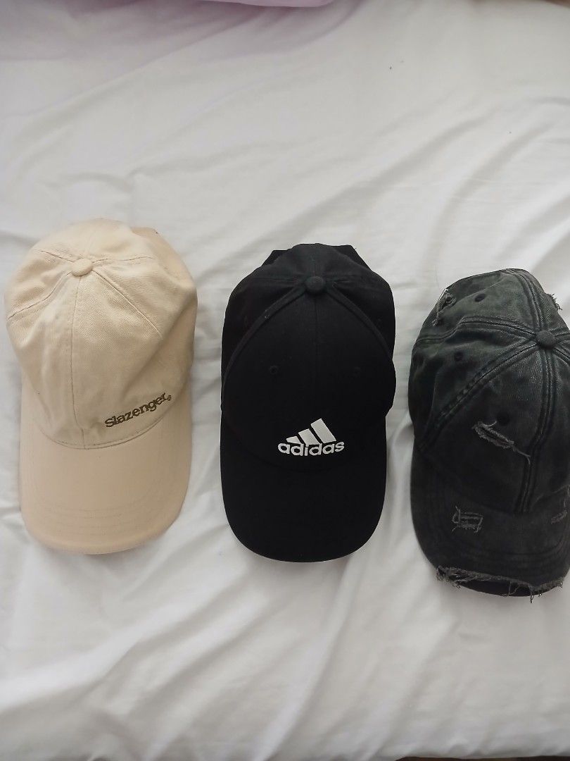 Cap (Category: Caps & Hats) located in Singapore. Submitted by coolvsfools (Listing ID 1438535759, Image 3). Description: Brand New - 1) Adidas $19 2) cotton on $15 Lightly used -3) slazenger $12 alry washed ready to use .
