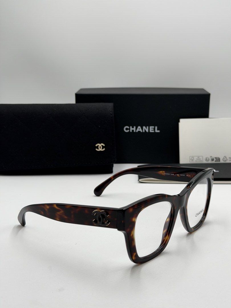 Chanel 3498 Butterfly Eyeglasses. (Category: Sunglasses & Eyewear) located in Quezon City. Submitted by _cmluxephilippines (Listing ID 1438637911, Image 1). Description: Chanel 3498 Butterfly Eyeglasses. They feature a dark tortoise shell acetate frame and a prominent interlocking CC logo on the temples. Chanel Key Details & Identification Brand: Chanel Model Number: CH3498 (often marked as 3498-A or 3498-S) Frame Material: High-quality gloss ace