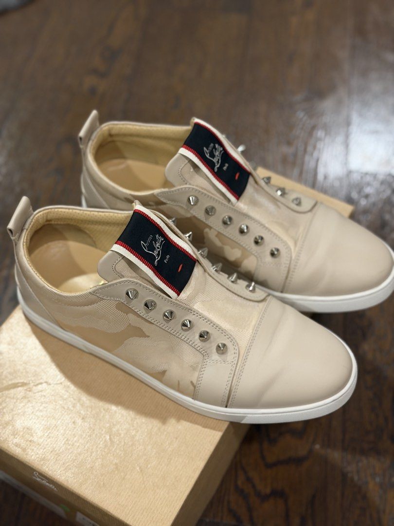 Christian Louboutin Spiked Sneakers (Category: Sneakers & Footwear) located in Taguig. Submitted by ericalopez (Listing ID 1438610849, Image 2). Description: Christian Louboutin Spiked Sneakers Price: 29,000 Size EU 44 Complete box and dust bag 100% Authentic Location: Pick up Or Delivery via lalamove or lbc .